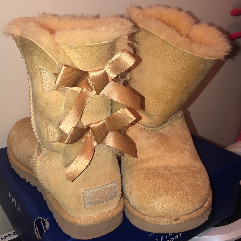 very comfortable soft,fluffy, and tan UGG boots.